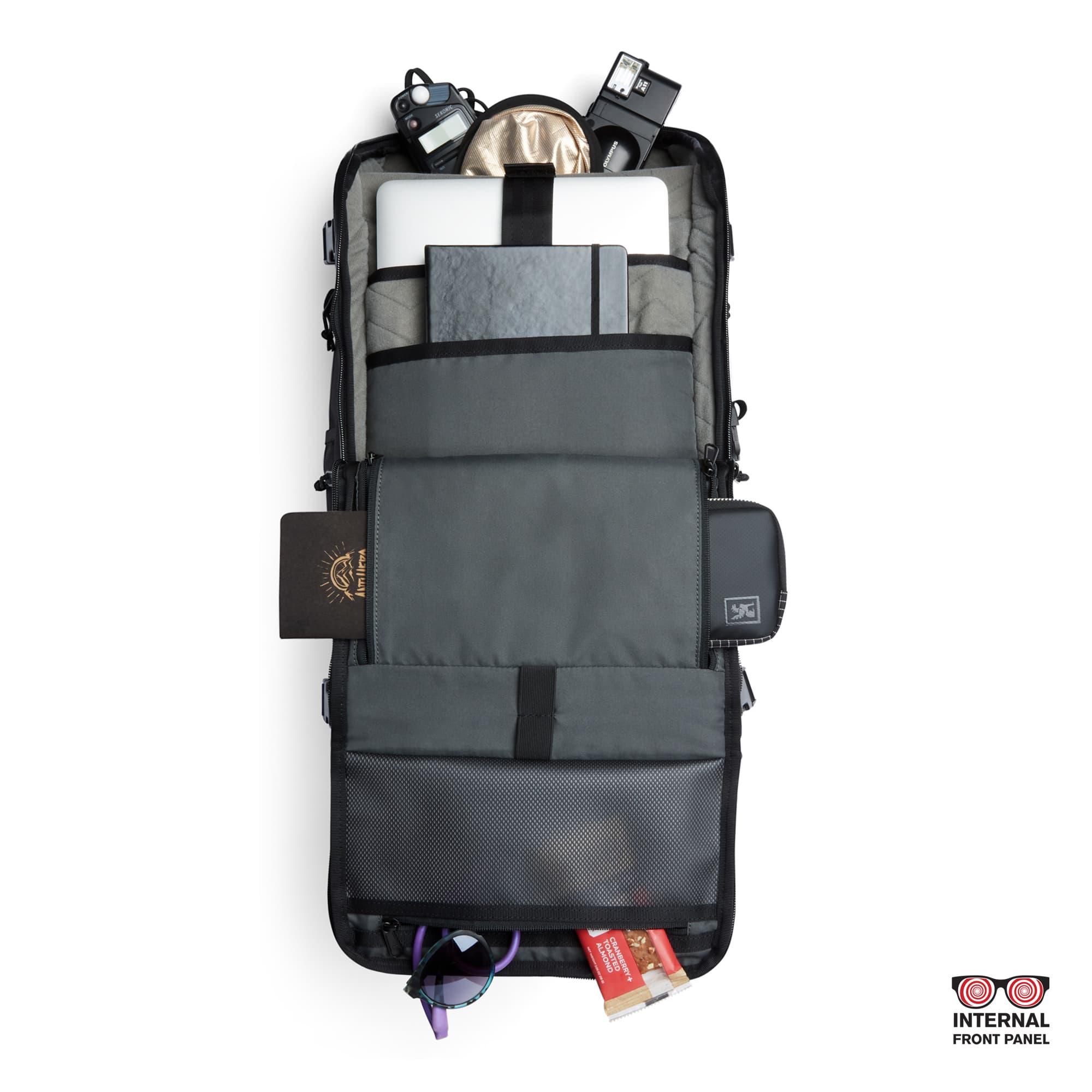 Niko camera tech backpack in black inside out pockets showing