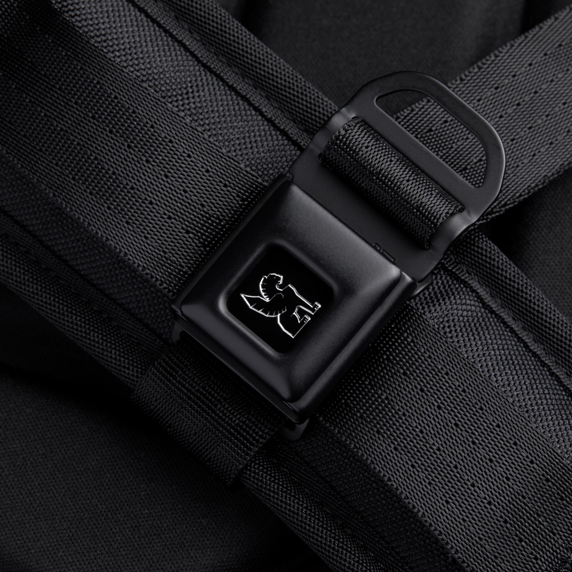 Niko camera tech backpack in black iconic Chrome buckle closure